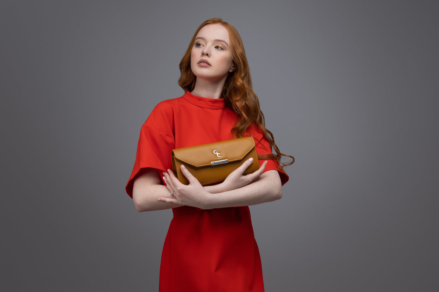 tan clutch bag